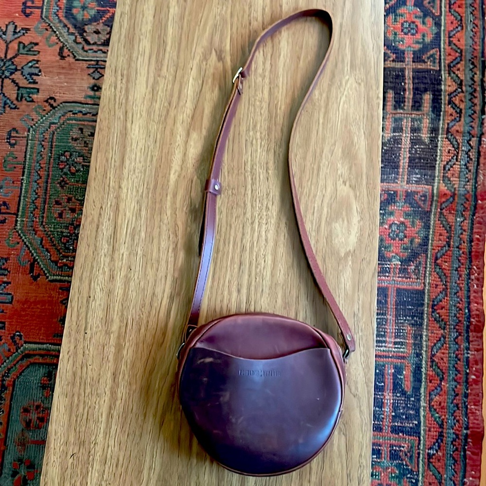 Burgundy, circular Portland Leather bag